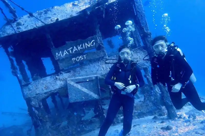 Exploring the Mataking Island underwater post office with Danglai Resort near the Tun Sakaran Marine Park
