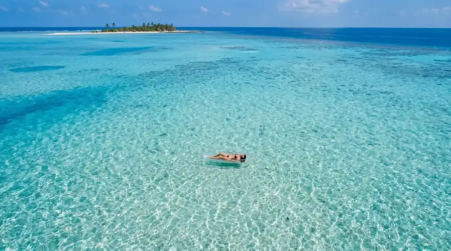 Kayaking in the clear shallow waters of Semporna Islands Danglai Resort